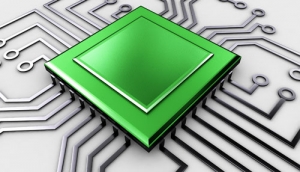 Systems-Development - A green microchip on a gray background